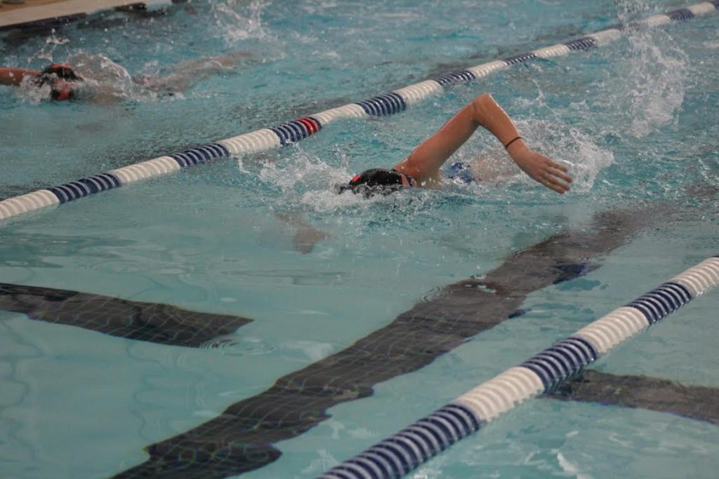Less Sugar, More Music: How the Swim Team Gears Up for State