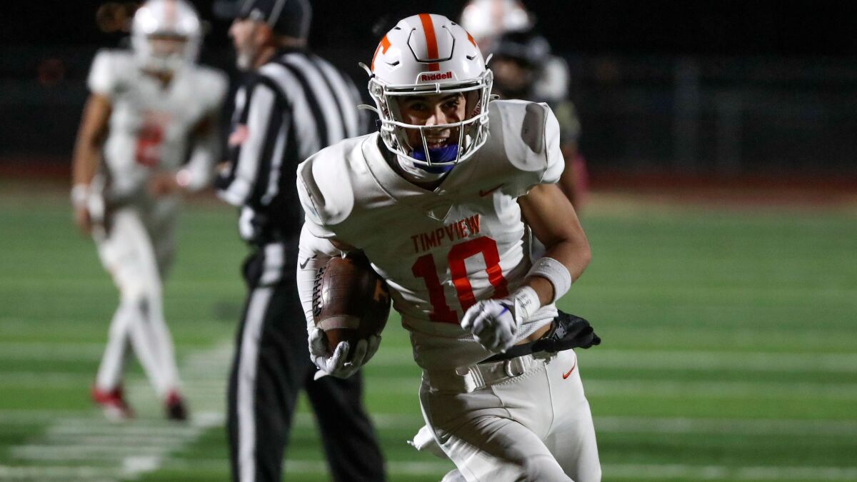 Tei Nacua scores a touchdown in Timpviews 42-20 win over Maple Mountain.