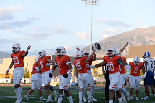 Timpviews+defense+celebrates+as+Haven+Halladay+recovers+a+fumble.++