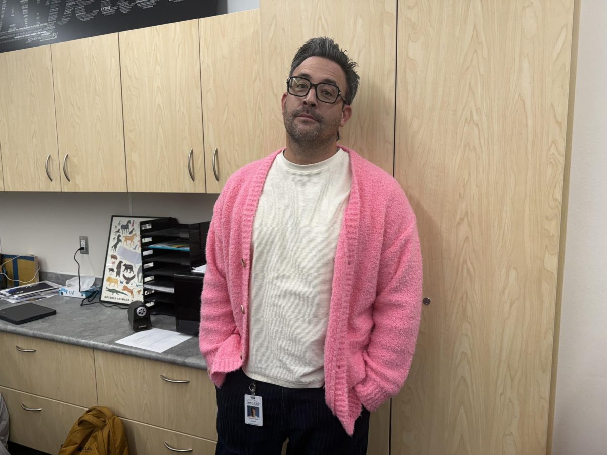 Cameron Chow caught rocking an oversized bright pink cardigan.